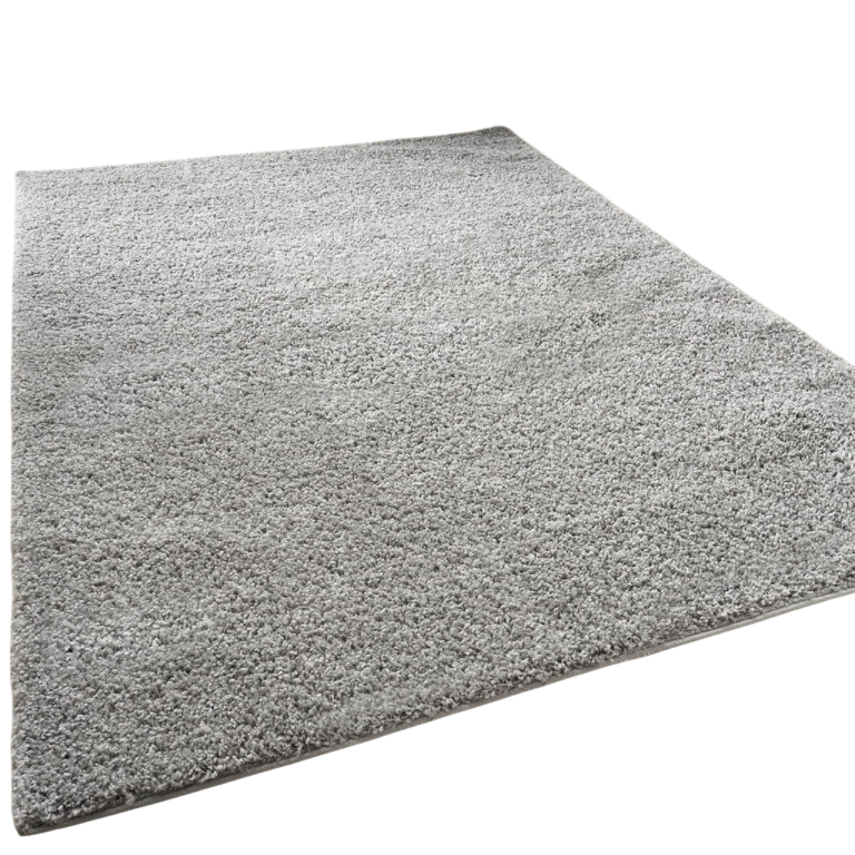 Light grey, plush area rug with a soft texture, rectangular shape.
